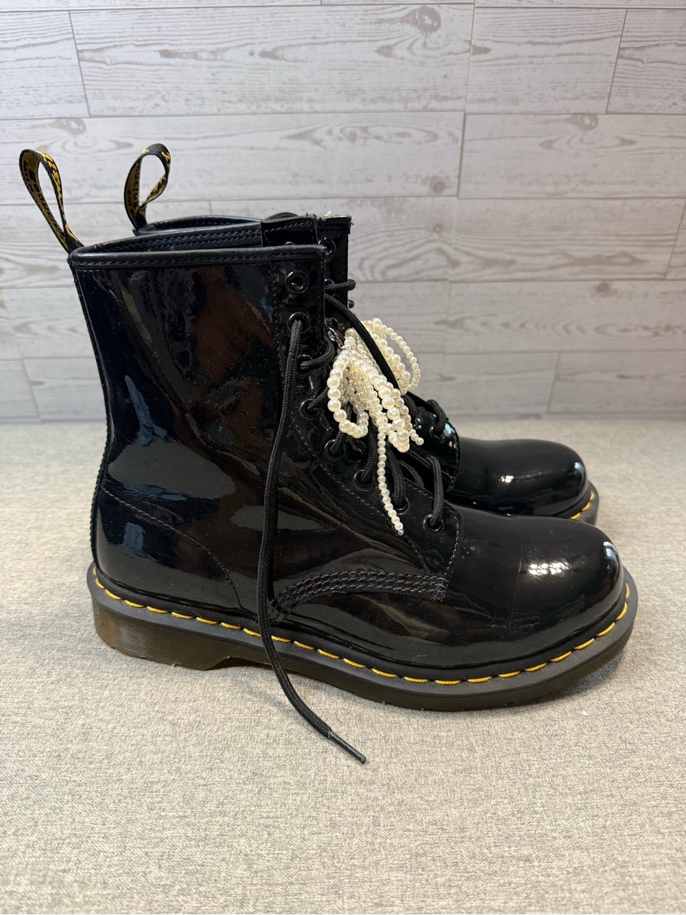 Dr. Martens Black Patent Leather Combat Boots with Yellow Stitching